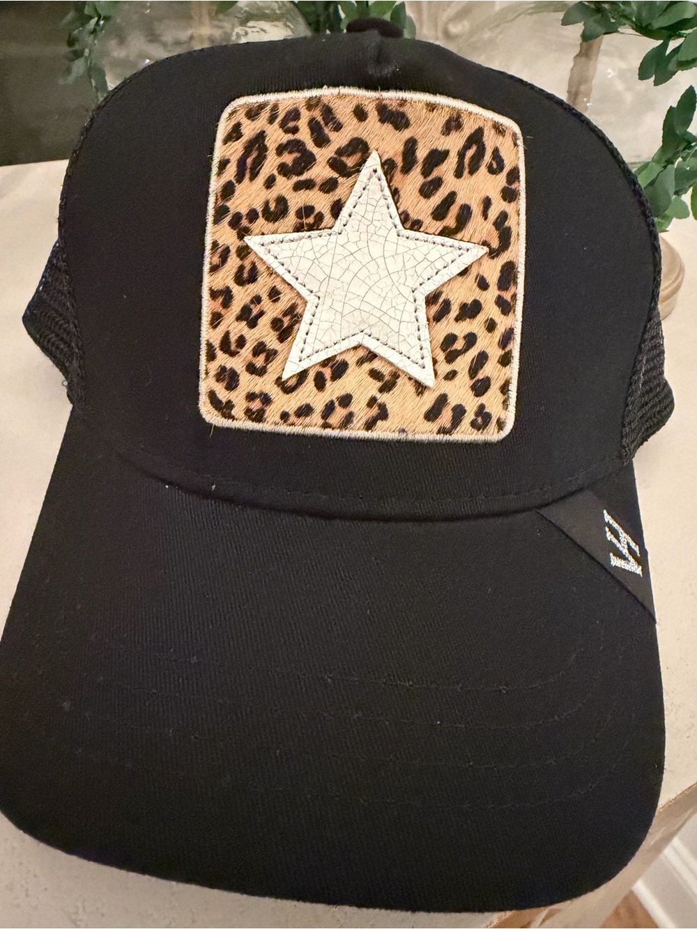 Vintage Havana Black Women's Trucker Hat with Furry Leopard Patch and White Star